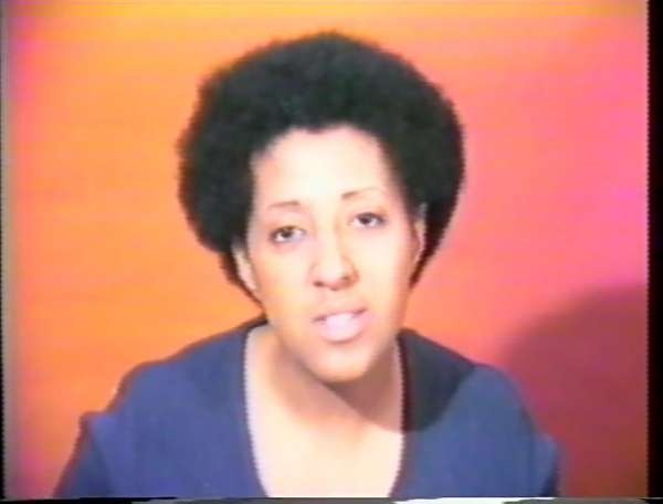 Color photograph of Howardena Pindell, an American artist, curator, and educator.